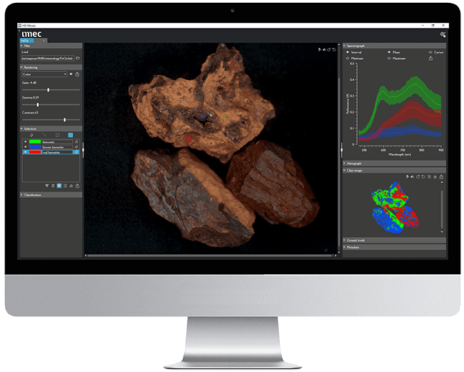 Example of imec's hyperspectral software. A picture of 3 brown rocks being analysed on a screen, on the right side of the rocks you can find statistics. 